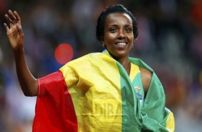 Tirunesh Dibaba makes it treble gold with 10,000m victory at world athletics